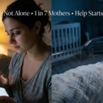 Mother experiencing postpartum depression at 3am holding glowing phone showing screening test while baby sleeps peacefully in background